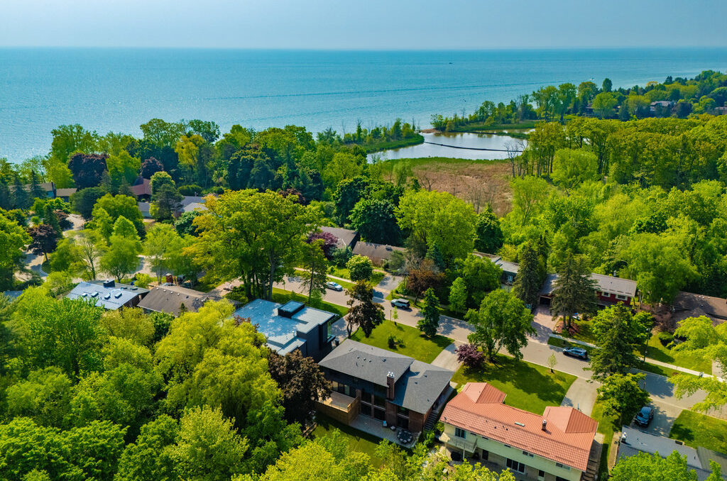 Aerial view of a tree-lined residential neighbourhood beside Lake Ontario in Mississauga