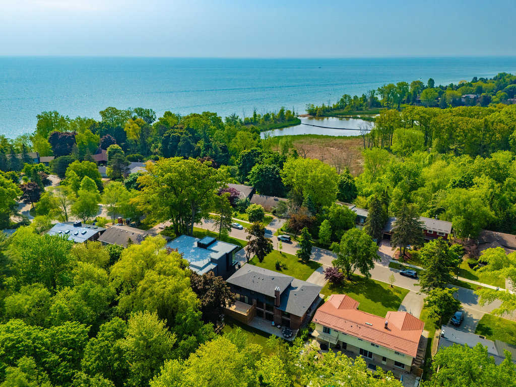 Aerial view of a tree-lined residential neighbourhood beside Lake Ontario in Mississauga