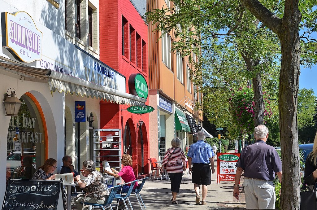 Shops and pedestrians along Lakeshore Road East in Downtown Oakville
