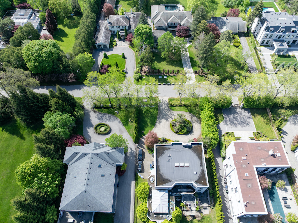 Aerial view of luxury residential neighborhood with lush green canopy in North York, Toronto